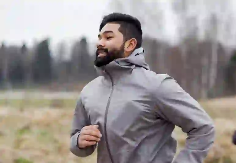 A man is running outdoors. - Maija Astikainen / Helsinki Partners